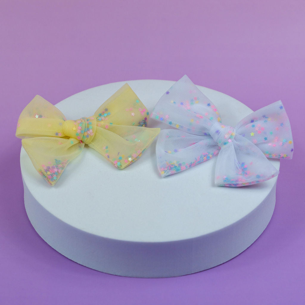 Bows with Floating Sparkles